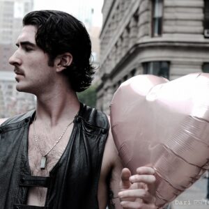 Boy with a heart baloon
